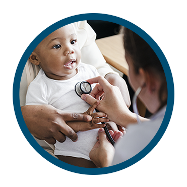 Compassionate health worker checking a babies heart with a stethoscope, exemplifying the principles of the Compassion Resilience Toolkit For Health and Human Services.